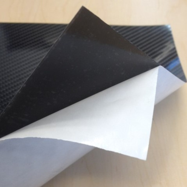 High - Gloss Adhesive Backing Sheet has Adhesive cover being peeled back